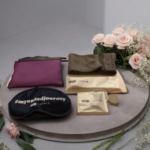 Travel pouch with travel essentials 7 piece kit. Unisex